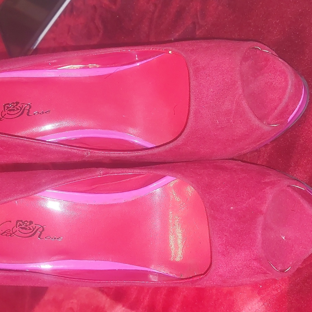 Shoes heels size 9 have red and purple I payed alot of money for them both 1200